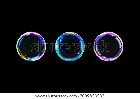 BUBBLES ISOLATED ON BLACK BACKGROUND