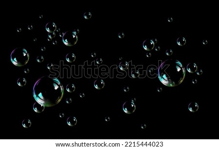 BUBBLES ISOLATED ON BLACK BACKGROUND. Rainbow soap bubbles on a black background. bubbles overlay. Realistic soap bubbles. Flying transparent water bubble.
