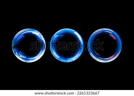BUBBLES ISOLATED ON BLACK BACKGROUND, BLUE SOAPY AIR WATER BUBBLE BACKDROP, TRANSPARENT ROUND CIRCLES WITH LIGHT REFLECTIONS ON DARK