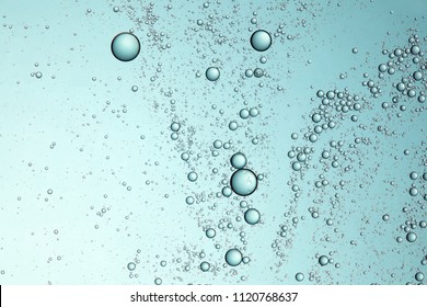 Bubbles Oil On Water In Glass Tank Aqua Colour Tone