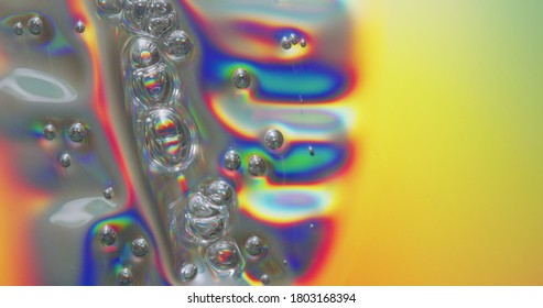 Bubbles On Melting Plastic. Bubbles Forming Across A Melting Plastic Surface.