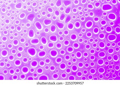 Bubbles purple background.Macro round bubbles texture in lilac tones.beautiful background with circles.Purple pattern with white circles.macro Bubbles set. 