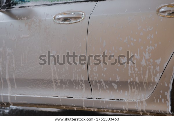 Bubbles with stains\
flowing from car\
washes.