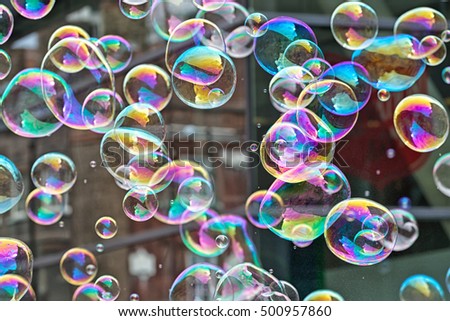 Similar – Image, Stock Photo Nu blow times fast ! (Boy portrait with soap bubbles, detail)