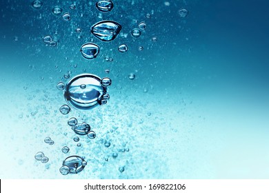 Bubbles Under Water On Blue Background