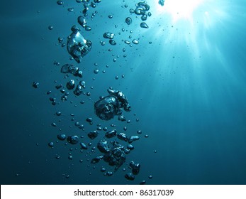 Bubbles undersea and sun.