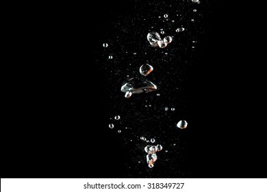 Bubbles Water At Black Background