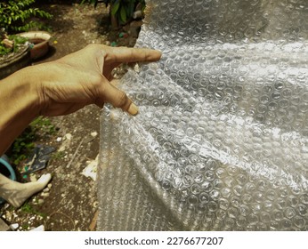 Buble pack plastic waste surface with textures as background 2d assets or 3 d assets, wallpaper, journalistic photography or article images