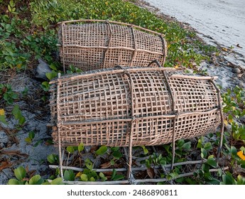 Bubu is a traditional fish trap made from bamboo - Powered by Shutterstock