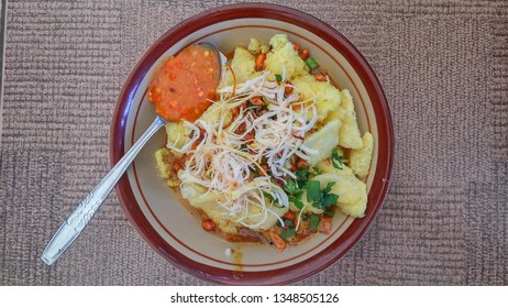 Bubur Ayam Or Porridge With Chicken.