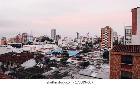 BUCARAMANGA, COLOMBIA - CIRCA DECEMBER 2019: Aerial View Of The City Of Bucaramanga At Dawn With Light Pink Sky.