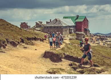 Bucegi Mountains, Romania - August 6, 2016: Thousands of tourists hike the trails to the Babele (The Old Women) chalet at 2206 m altitude in Bucegi Mountains to visit the Babele Rocks and the Sphinx.