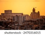 Bucharest, the city seen from above in the sunset light.