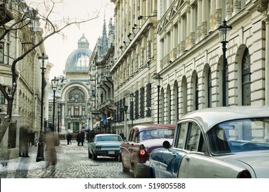 Bucharest old city with vintage cars on street