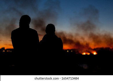 Bucharest, Romania- 02 24 2020: Huge bush fire in Delta Vacaresti- Parcul Natural Vacaresti , over 5 ha of vegetation burned down, fanned by strong winds. People were watching from the distance.  