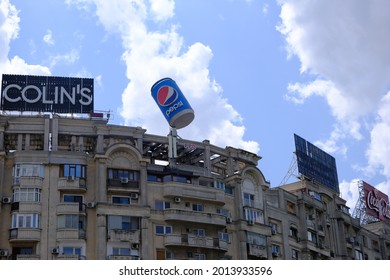 Bucharest Romania 07.21.2021: A Large Advertising Bank Of Pepsi On The Top Of A Building In The Center Of Bucharest