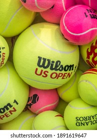 Bucharest Romania - 12.22.2020: Many Wilson US Open Tennis Balls For Sale. Pink And Yellow Tennis Balls.