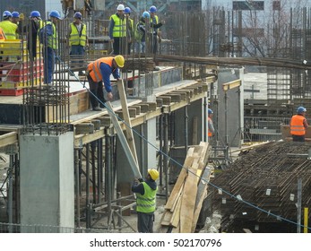 Bucharest, Romania, 16  February 2016: Laborers work at the construction site of a building in Bucharest. - Shutterstock ID 502170796