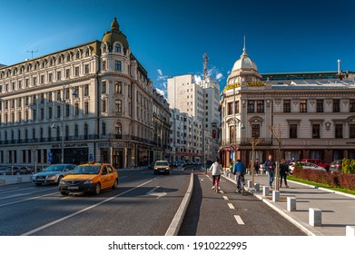 Bucharest, Romania - 2015: Victoriei Avenue during an amazing spring day with beautiful light on the buildings from the city center
