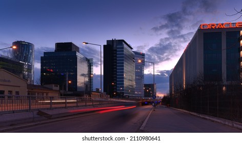Bucharest, Romania - 2022: Bucharest by night, the north part of the city with modern tall office buildings where are located headquarters of some corporations. Global Worth Plaza and Sky Tower.