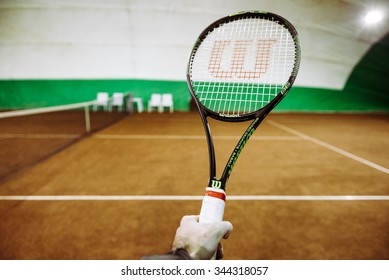 BUCHAREST, ROMANIA - 27 November 2015: Wilson tennis racquet in tennis court in Bucharest, Romania.