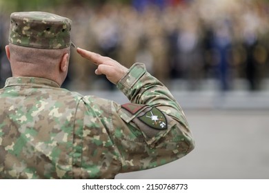 Bucharest, Romania - April 28, 2022: Romanian Land Forces Soldier Salutes During A Public Ceremony.