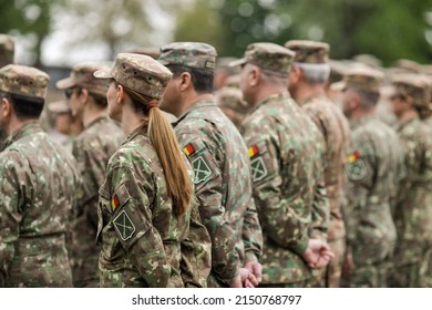 Bucharest, Romania - April 28, 2022: Romanian Female Land Forces Soldier Take Part At A Public Ceremony.