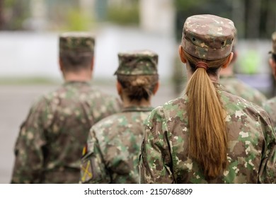 Bucharest, Romania - April 28, 2022: Romanian Female Land Forces Soldier Take Part At A Public Ceremony.