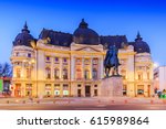 Bucharest, Romania. The Central University Library and statue of King Carol I of Romania