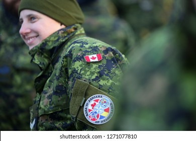 Bucharest, Romania - December 1, 2018: Details With The Uniform And Flag Of Canadian Soldiers Taking Part At The Romanian National Day Military Parade.