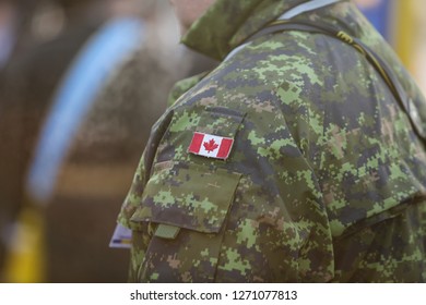 Bucharest, Romania - December 1, 2018: Details With The Uniform And Flag Of Canadian Soldiers Taking Part At The Romanian National Day Military Parade.