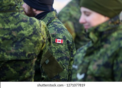 Bucharest, Romania - December 1, 2018: Details With The Uniform And Flag Of Canadian Soldiers Taking Part At The Romanian National Day Military Parade.