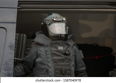 Bucharest, Romania - December 1, 2019: Officer from the Romanian Intelligence Service (SRI) wearing a EOD (Explosive Ordnance Disposal)  protective costume at the Romanian National Day military parade