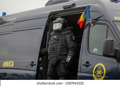 Bucharest, Romania - December 1, 2019: Officer from the Romanian Intelligence Service (SRI) wearing a EOD (Explosive Ordnance Disposal) protective costume at the Romanian National Day military parade.