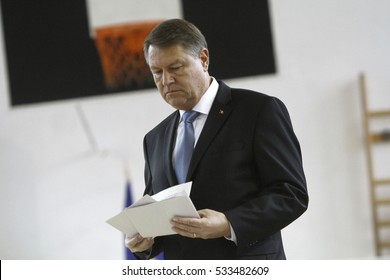 BUCHAREST, ROMANIA - DECEMBER 11, 2016: Romanian President Klaus Iohannis Casts His Vote In Parliamentary Elections.