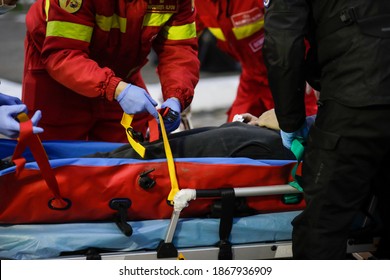 Bucharest, Romania - December 5, 2020: Paramedics From The Romanian Ambulance (SMURD) Exercise The Rescue Of A Car Crash Victim.