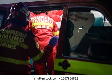 Bucharest, Romania - December 5, 2020: Paramedics From The Romanian Ambulance (SMURD) Exercise The Rescue Of A Car Crash Victim.