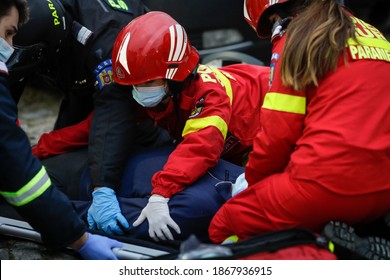 Bucharest, Romania - December 5, 2020: Paramedics from the Romanian Ambulance (SMURD) exercise the rescue of a car crash victim.