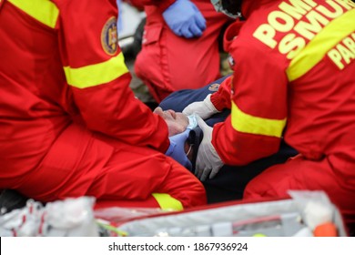 Bucharest, Romania - December 5, 2020: Paramedics From The Romanian Ambulance (SMURD) Exercise The Rescue Of A Car Crash Victim.