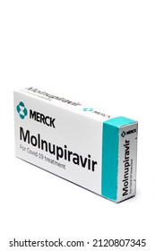 Bucharest, Romania - February 2, 2022: Illustrative Editorial Concept Image Of Oral Antiviral Drug Pill Molnupiravir Developed By Merck. Corona Virus Covid-19 Treatment.