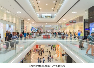 BUCHAREST, ROMANIA - JULY 06, 2015: People Crowd Rush In Shopping Luxury Mall Interior.