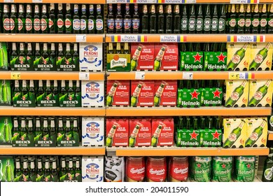 BUCHAREST, ROMANIA - JULY 09, 2014: Beer Cans On Supermarket Shelf.