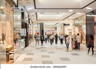 BUCHAREST, ROMANIA - JUNE 06, 2015: Shoppers Rush In Luxury Shopping Mall Interior.