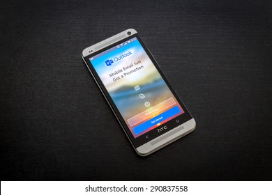 Bucharest, Romania - June 26, 2015: Microsoft Outlook Email App On Screen Of A Mobile Smartphone. Microsoft Launches New Office Productivity Tools Apps For Mobile Devices.