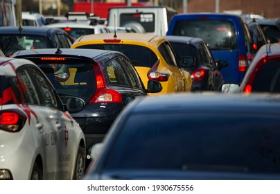 Bucharest, Romania - March 03, 2021: Cars In Traffic At Rush Hour On A Boulevard In Bucharest.