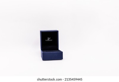 BUCHAREST, ROMANIA -MARCH 06, 2022: Swarovski empty blue open box for jewellery isolated on white.