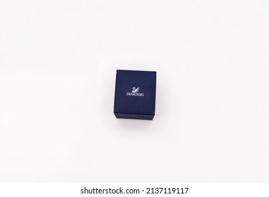 BUCHAREST, ROMANIA -MARCH 06, 2022: Swarovski empty blue closed box for jewellery isolated on white.