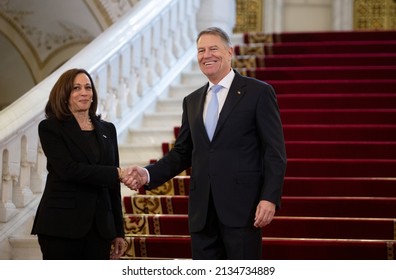 Bucharest, Romania - March 11 2022 - U.S. Vice President Kamala Harris, left, is greeted by Romanian President Klaus Iohannis during their meeting in Bucharest, Romania