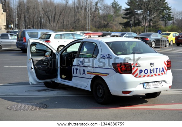 Bucharest,\
Romania - March 20, 2019: Police in proximity of Arch du Triumph,\
directing traffic on a protest day in Bucharest (transporters from\
Romania protesting in front of the\
government)