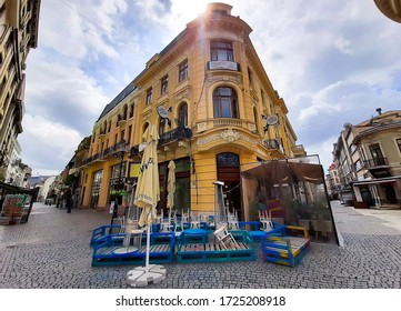Bucharest, Romania - May 05, 2020: Tables and chairs are stored in front of a restaurant temporary closed during the state of emergency due to coronavirus in the Old Town of Bucharest.